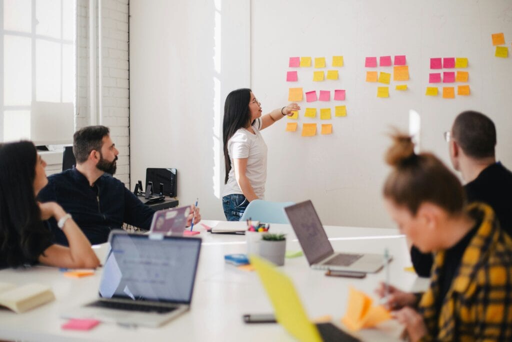 An infographic depicting a marketing team working on a funnel that integrates SEO, PPC, and social media channels.